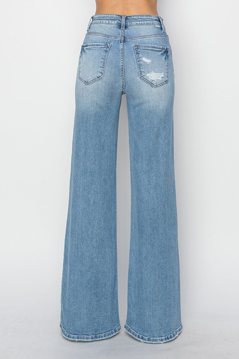 Risen High-Rise Wide Distressed Western Jeans — Light Wash Playful Distressing with Wide-Leg Cut